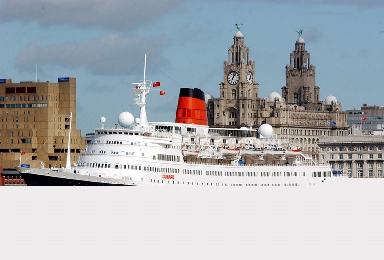 Cruise liner on the River Mersey with the Liver Buildings in the background