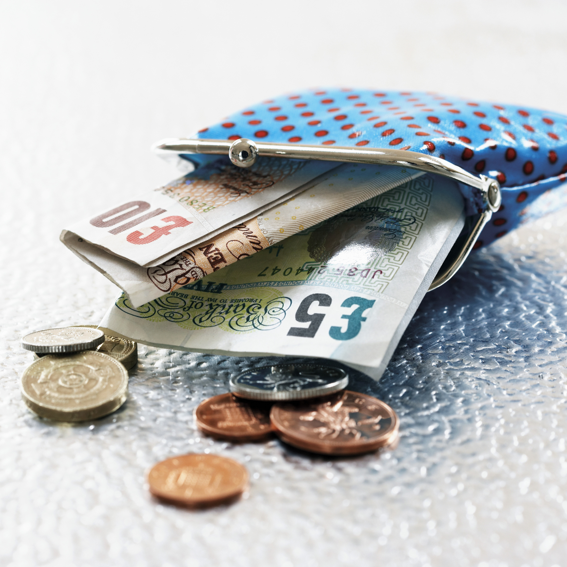 A purse with coins and banknotes