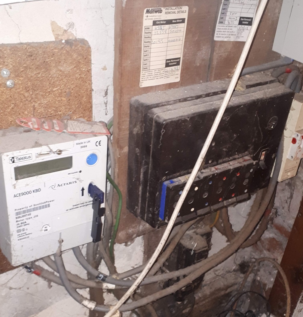 Outdated fuse board at the property