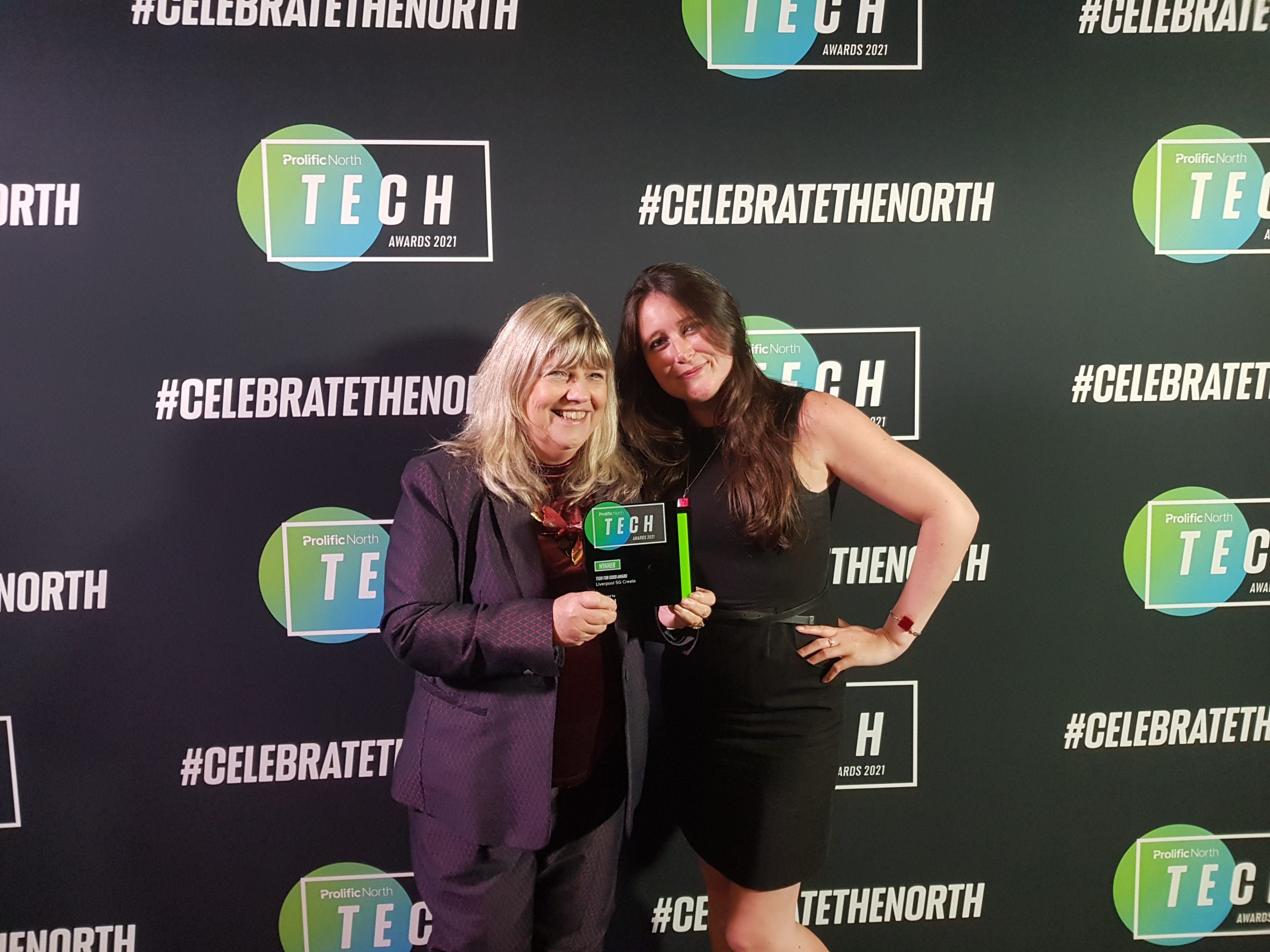 Ann Williams and receives an award for Liverpool's 5G project