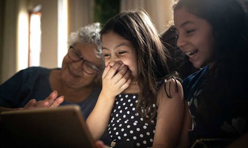 Family using a computer together