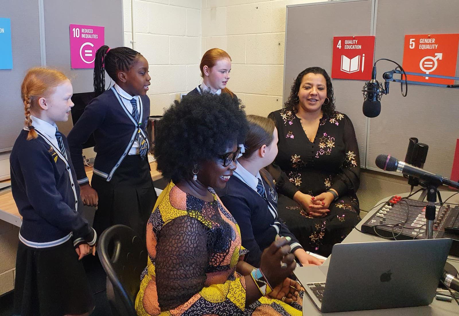Joanne Anderson with Marieme Jamme and Childwall Valley Primary pupils