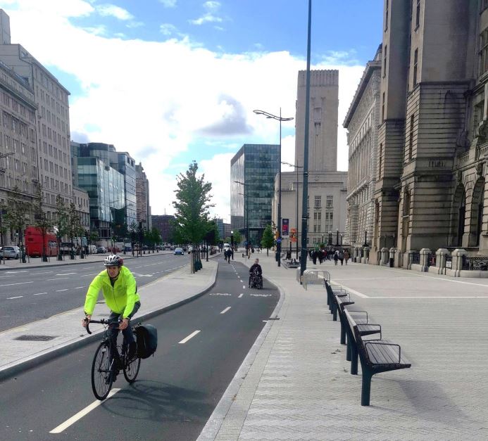 Cyclist riding on a cycle lane in Liverpool