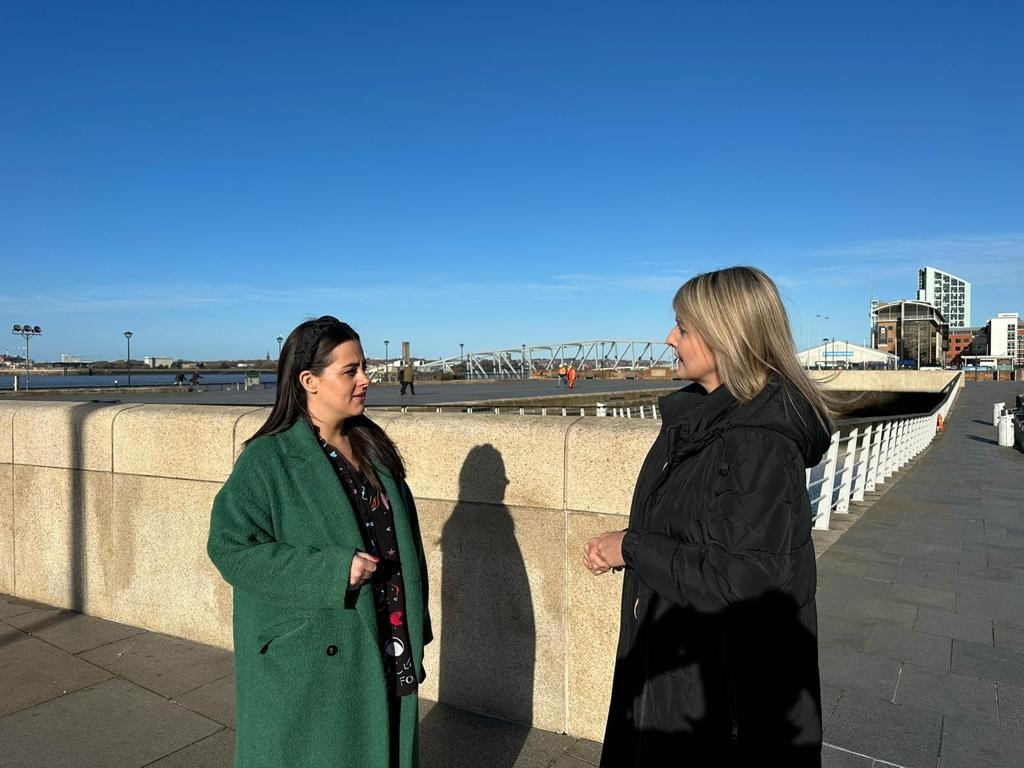 Sue Gibson (Right) chats to colleague Kate Gilston on Liverpool's Pier Head
