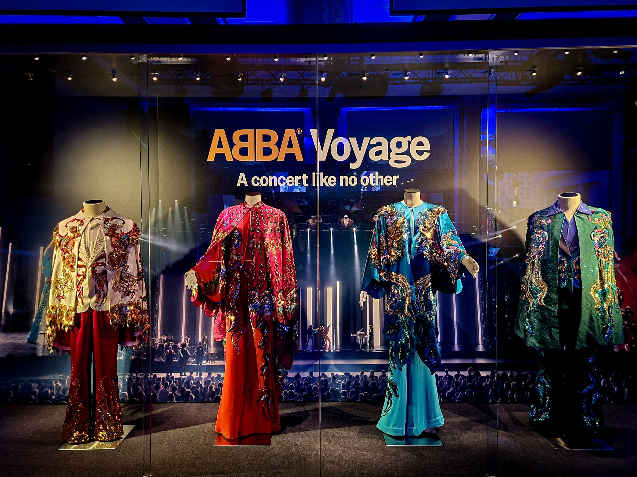 Image of ABBA outfits on display