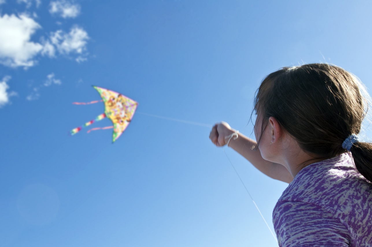 A child flying a kite