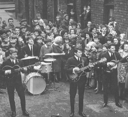 Merseybeat band The Searchers perform their 1963 No 1 hit ‘Sweets For My Sweet’ in Deacon Street, Everton.