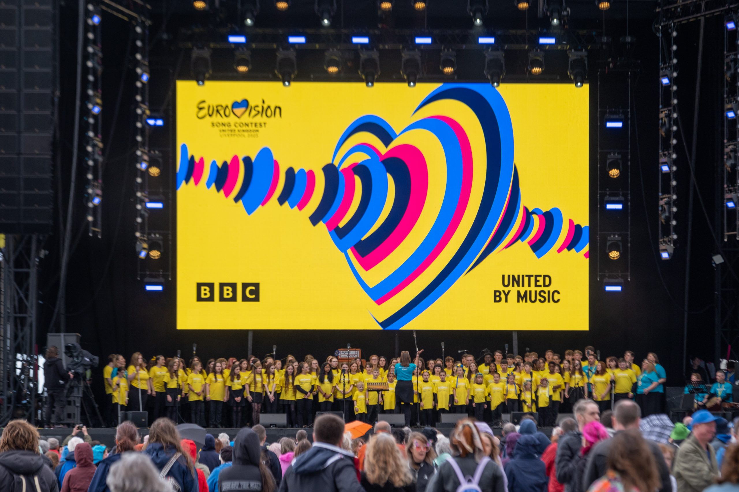 The 100 Voices choir performing on the Eurovision Village stage in May 2023
