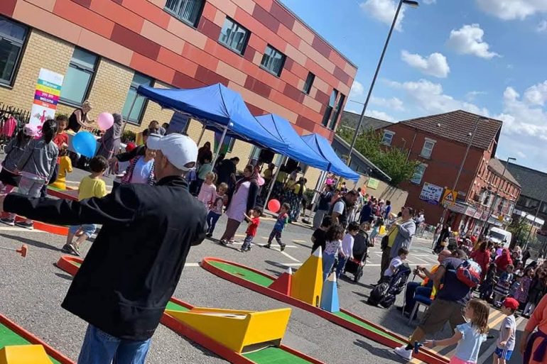 People (Smithdown Community) having a street party outside Picton Children's Centre