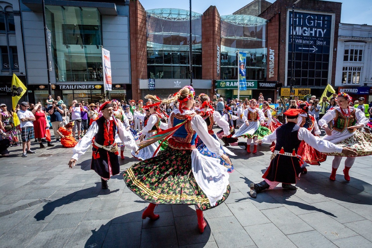 People dancing on the pavement