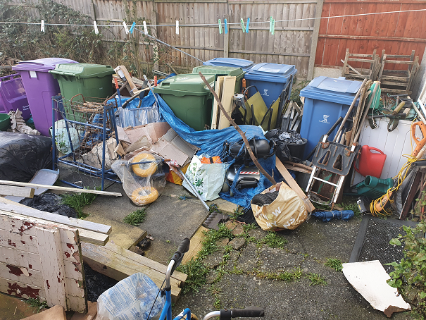 Fly tipping in a yard