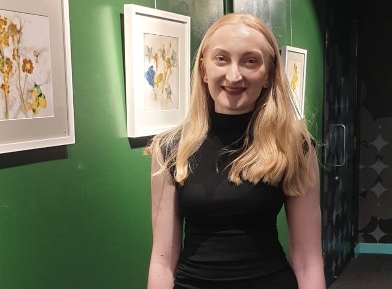 A young women with long blonde hair