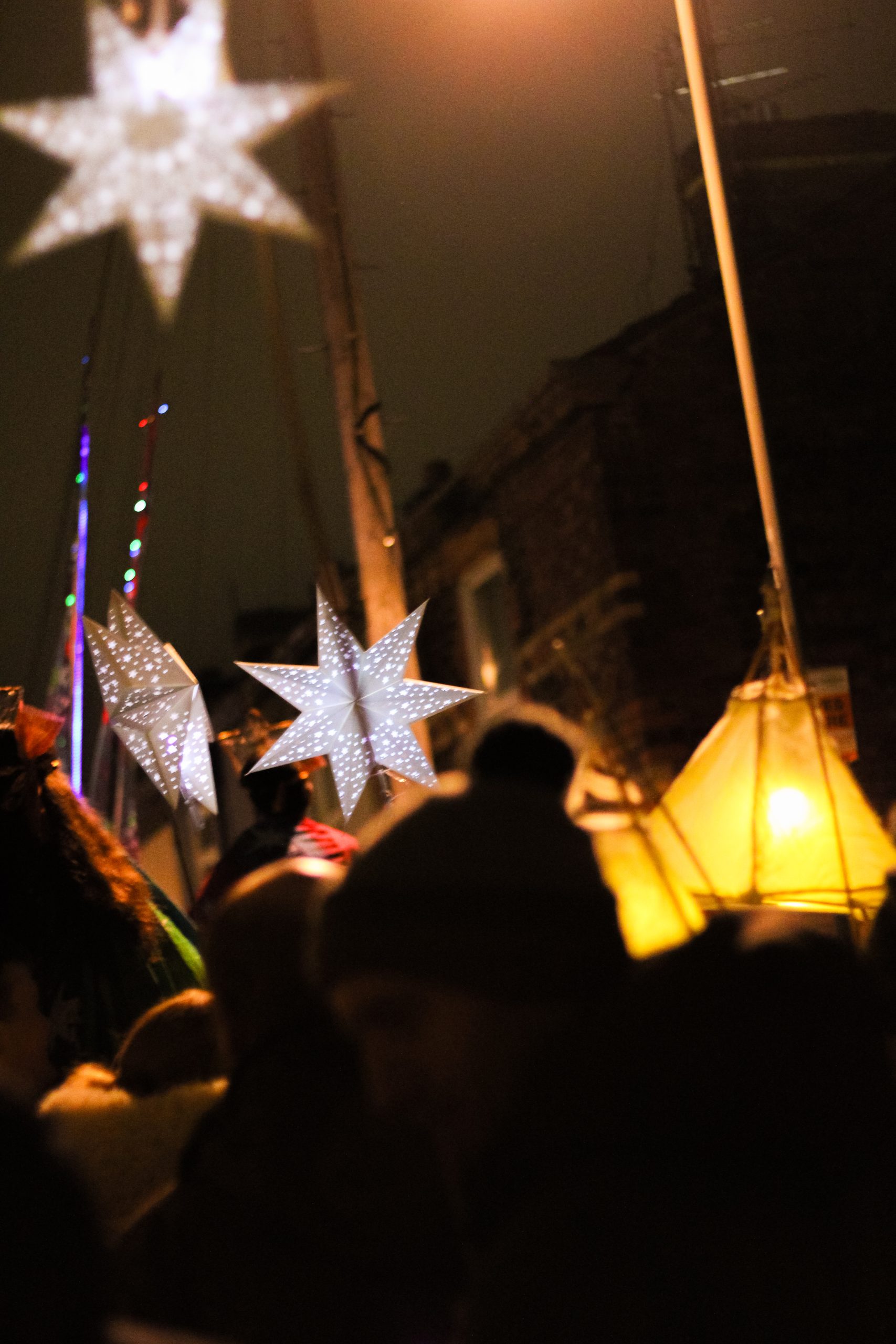 Lit lanterns hanging down